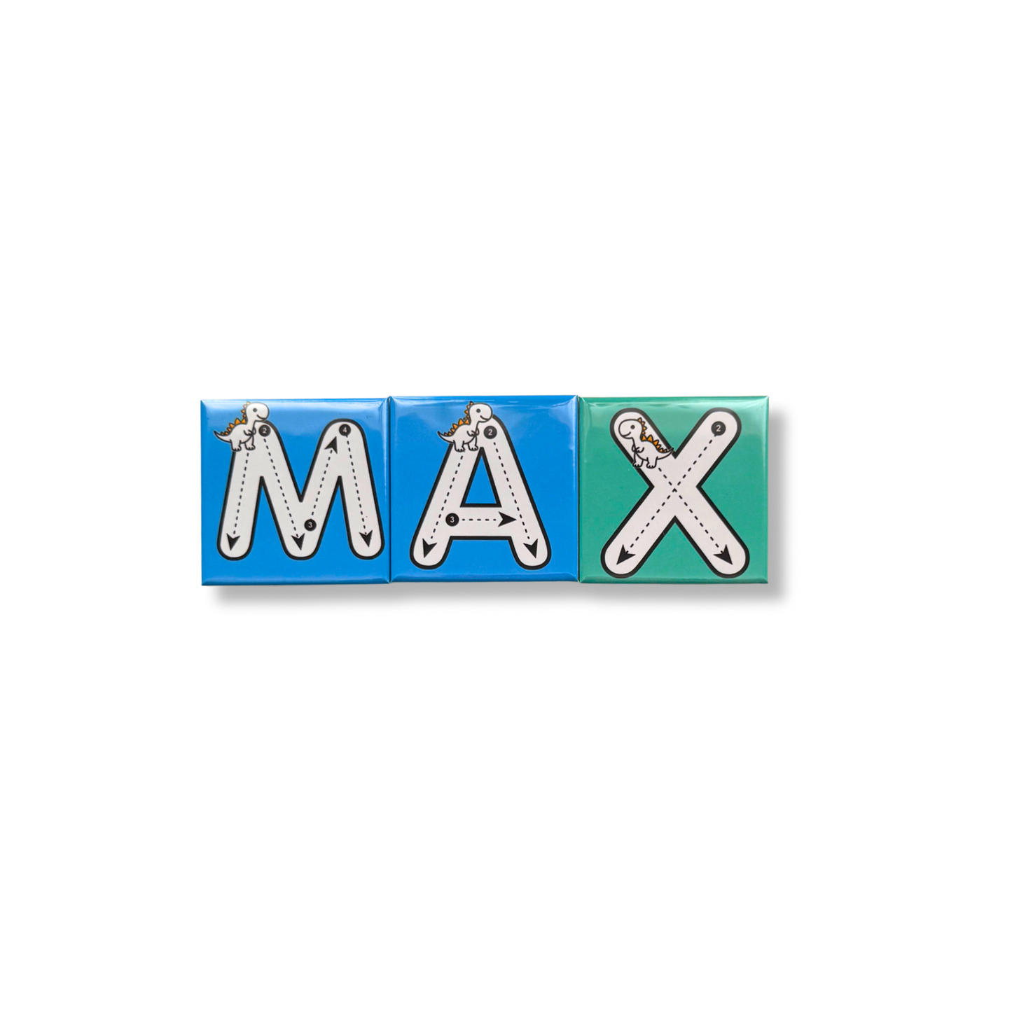 A set of three custom name tracing magnets spelling MAX. The magnets are blue and green with dashed tracing lines and small white dinosaur illustrations for early learning and name recognition.