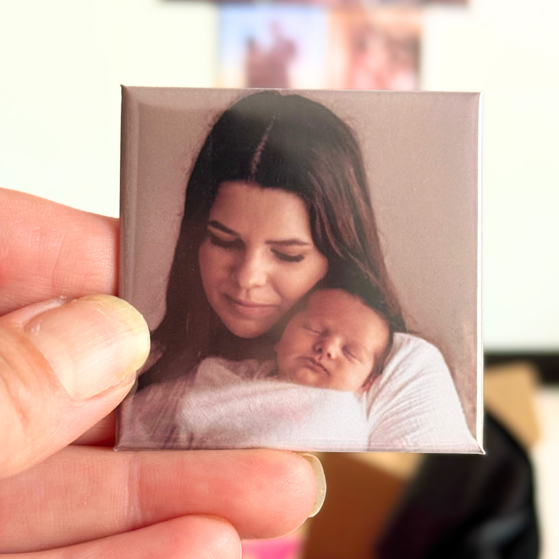 Hand holding a personalised Mothers Day photo magnet featuring a mum and newborn baby, handmade in Australia