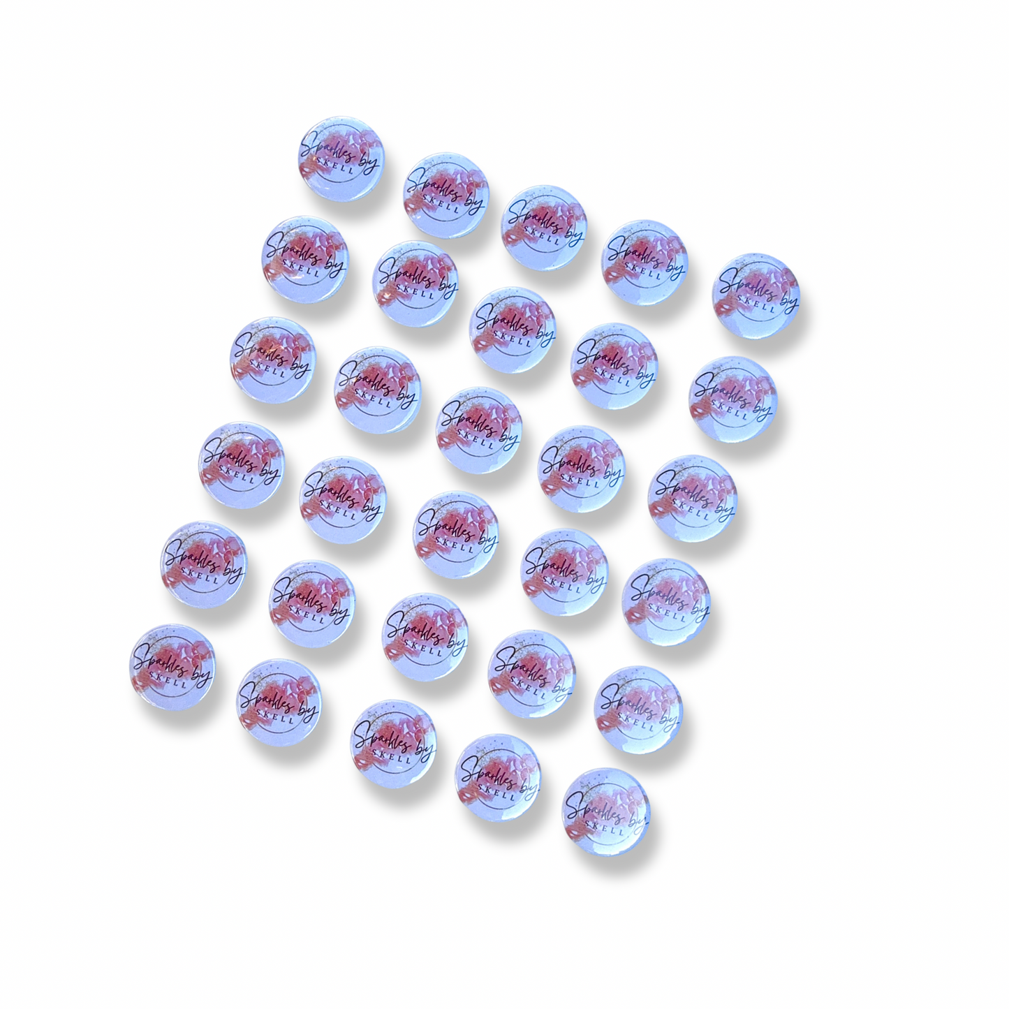 A grid displaying thirty small, round white and pink custom logo magnets.