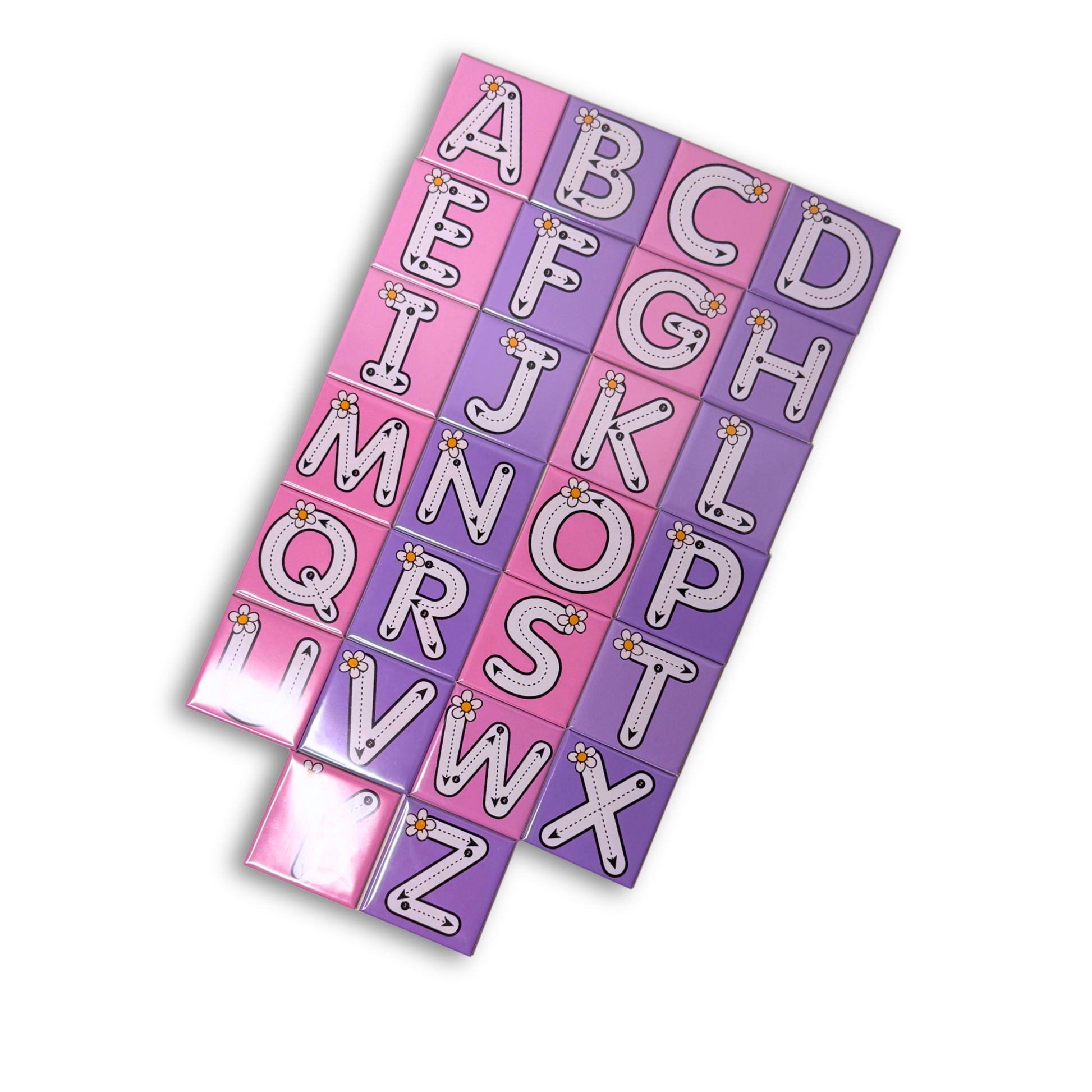 A top-down view of the complete A-Z alphabet tracing magnet set featuring pink and purple magnets with dashed tracing lines and small daisy flower illustrations for early learning and handwriting practice.