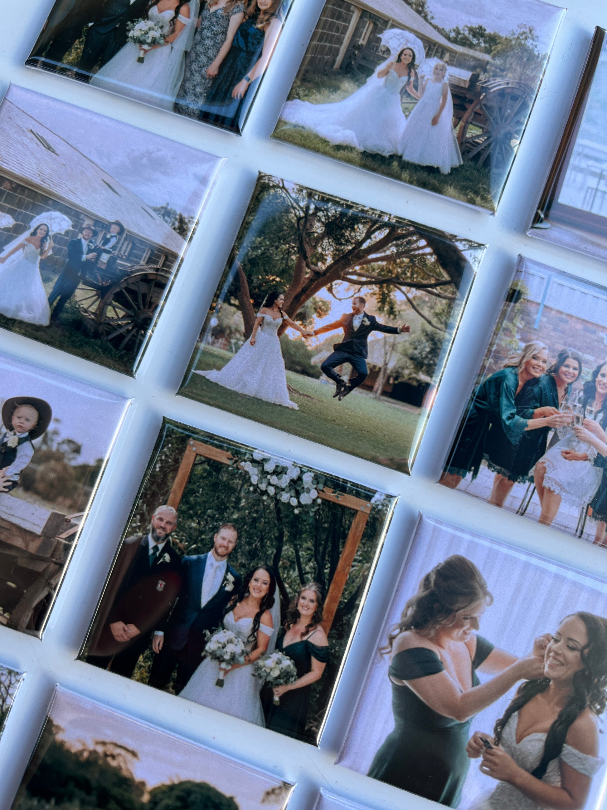 Photo of custom fridge magnets. A couples wedding.